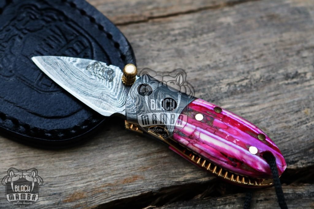 BMK-415-PK Pink Tsetse Fly 3.5″ Long 1.5″Blade” 2oz Damascus Neck Knives Handmade Damascus Pocket Folding Knife With Mammoth Tooth Handle Black Mamba Hand Made World Class Knives USA Made - Image 4