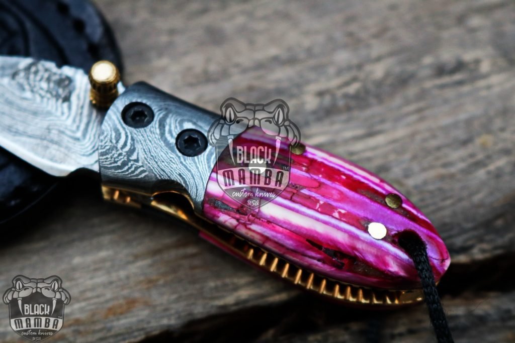 BMK-415-PK Pink Tsetse Fly 3.5″ Long 1.5″Blade” 2oz Damascus Neck Knives Handmade Damascus Pocket Folding Knife With Mammoth Tooth Handle Black Mamba Hand Made World Class Knives USA Made - Image 6