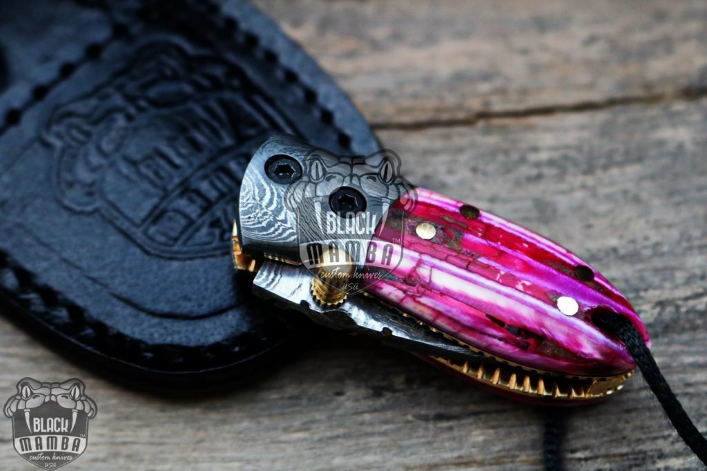 BMK-415-PK Pink Tsetse Fly 3.5″ Long 1.5″Blade” 2oz Damascus Neck Knives Handmade Damascus Pocket Folding Knife With Mammoth Tooth Handle Black Mamba Hand Made World Class Knives USA Made - Image 10