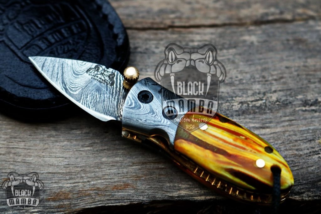 BMK-415YL Yellow Tsetse Fly 3.5″ Long 1.5″Blade” 2oz Damascus Neck Knives Handmade Damascus Pocket Folding Knife With Mammoth Tooth Handle Black Mamba Hand Made World Class Knives USA Made - Image 3