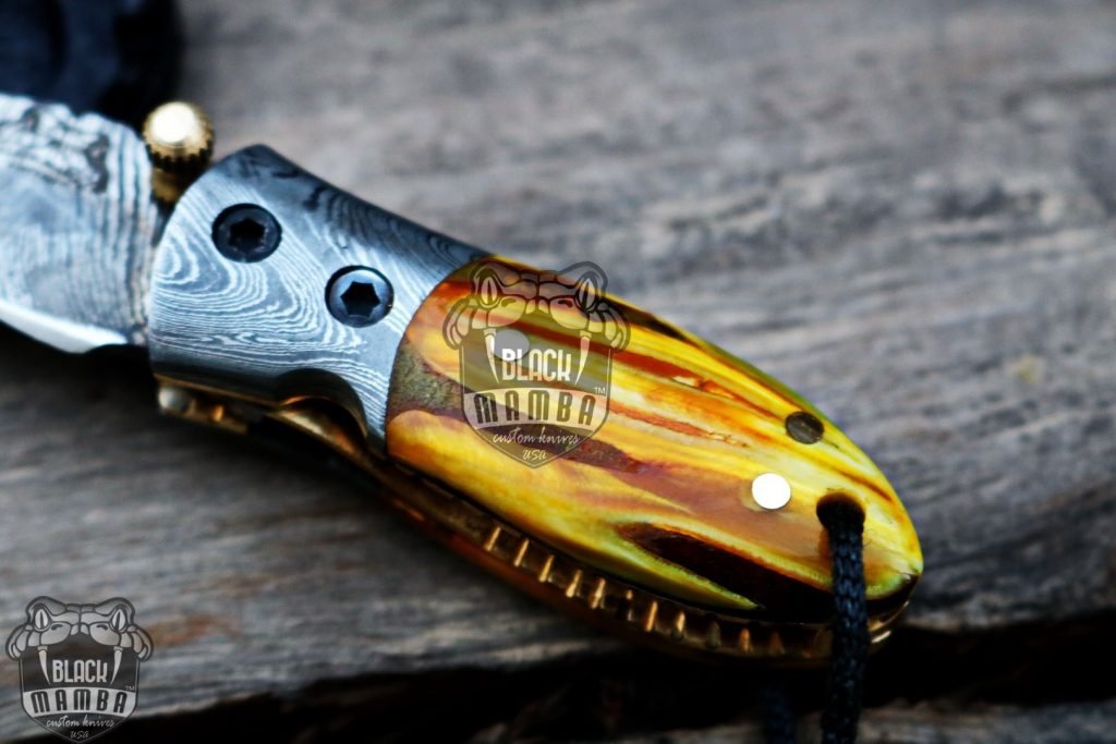 BMK-415YL Yellow Tsetse Fly 3.5″ Long 1.5″Blade” 2oz Damascus Neck Knives Handmade Damascus Pocket Folding Knife With Mammoth Tooth Handle Black Mamba Hand Made World Class Knives USA Made - Image 5