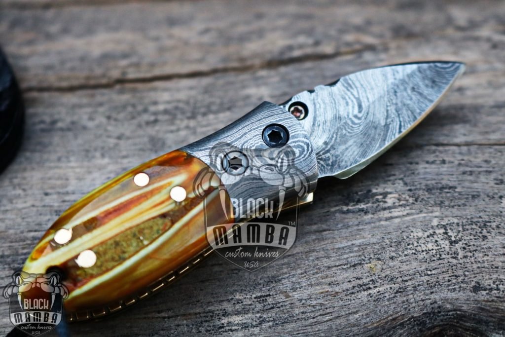 BMK-415YL Yellow Tsetse Fly 3.5″ Long 1.5″Blade” 2oz Damascus Neck Knives Handmade Damascus Pocket Folding Knife With Mammoth Tooth Handle Black Mamba Hand Made World Class Knives USA Made - Image 6