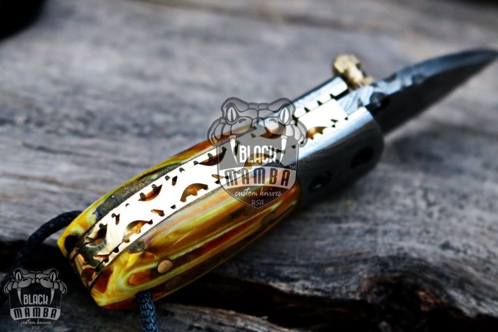 BMK-415YL Yellow Tsetse Fly 3.5″ Long 1.5″Blade” 2oz Damascus Neck Knives Handmade Damascus Pocket Folding Knife With Mammoth Tooth Handle Black Mamba Hand Made World Class Knives USA Made - Image 7