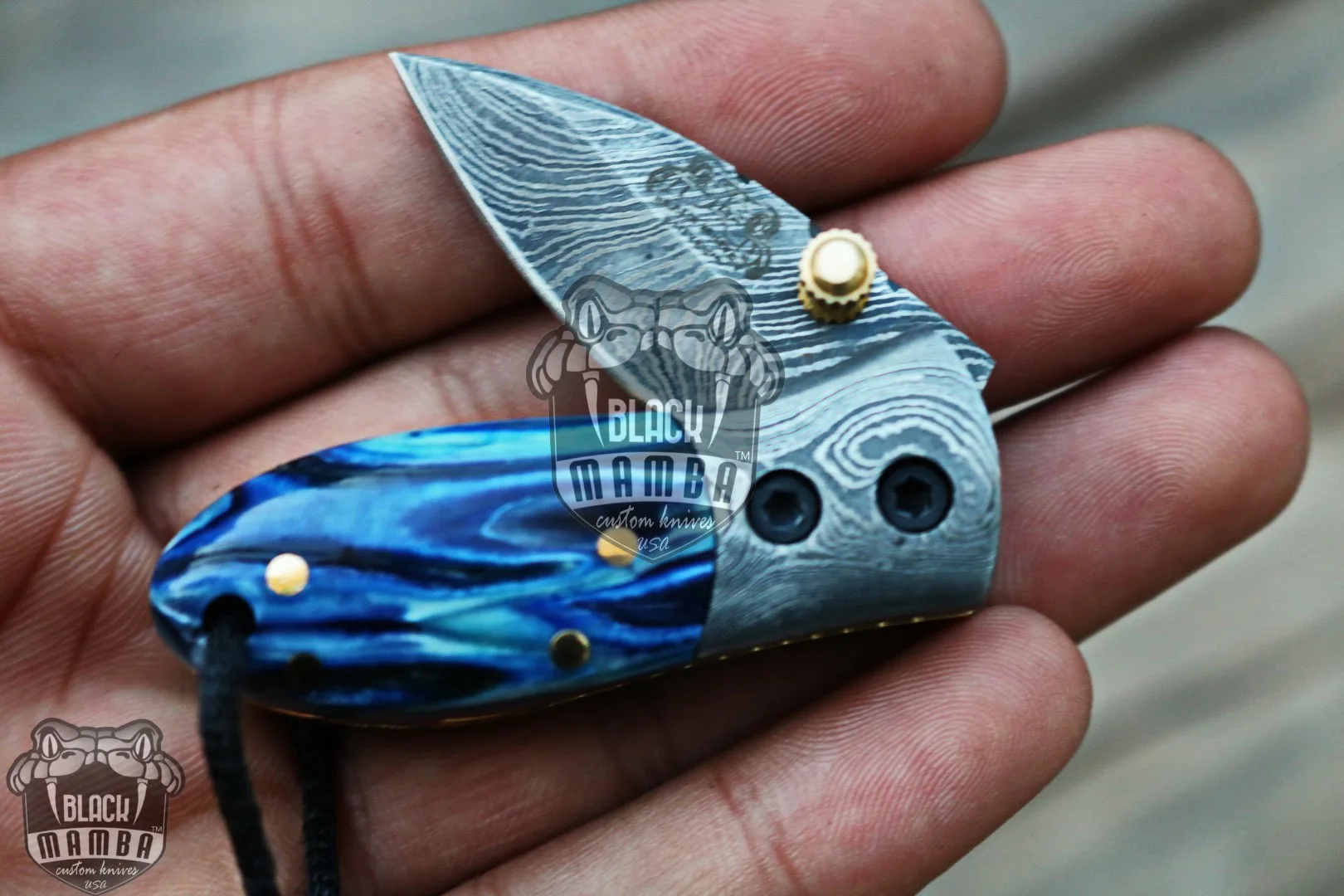 Blue Tsetse Fly 3.5″ Long 1.5″ Blade” 2oz Damascus Neck Knives Handmade Damascus Pocket Folding Knife with Mammoth Tooth Handle Black Mamba Hand Made World Class Knives USA Made | BMK-415-BU - view 2