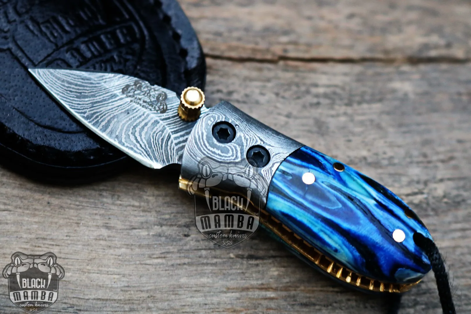 Blue Tsetse Fly 3.5″ Long 1.5″ Blade” 2oz Damascus Neck Knives Handmade Damascus Pocket Folding Knife with Mammoth Tooth Handle Black Mamba Hand Made World Class Knives USA Made | BMK-415-BU - view 3