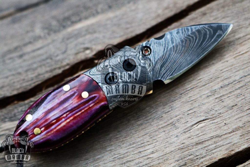 BMK-415-RD Red Tsetse Fly 3.5″ Long 1.5″Blade” 2oz Damascus Neck Knives Handmade Damascus Pocket Folding Knife With Mammoth Tooth Handle Black Mamba Hand Made World Class Knives USA Made - Image 6