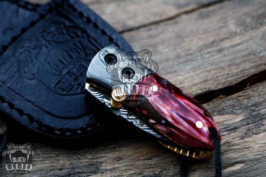 BMK-415-RD Red Tsetse Fly 3.5″ Long 1.5″Blade” 2oz Damascus Neck Knives Handmade Damascus Pocket Folding Knife With Mammoth Tooth Handle Black Mamba Hand Made World Class Knives USA Made - Image 9