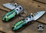 BMK-415-GR Green Tsetse Fly 3.5″ Long 1.5″Blade” 2oz Damascus Neck Knives Handmade Damascus Pocket Folding Knife With Mammoth Tooth Handle Black Mamba Hand Made World Class Knives USA Made