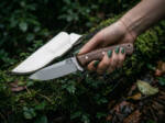 Cedar Wren D2 drop point ladies hunting knife with walnut handle and cream leather sheath held in hand outdoors