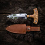 Snowburl mirror polished D2 push dagger with cream stabilised burl T-handle and tan leather sheath