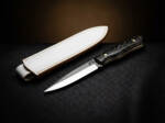 Midnight Gild D2 spear point ladies knife with black and gold resin handle and cream leather sheath