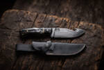 Blackthorn satin D2 gut hook hunting knife with buffalo horn handle, brass spacer and black leather sheath