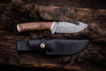 Vermillion Coil Damascus gut hook hunting knife with rosewood handle, brass bolster and black leather sheath