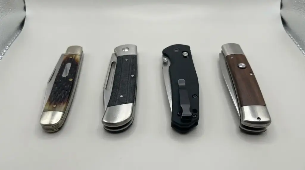 Four closed folders showing slipjoint, lockback, liner lock and automatic builds