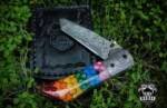 Sheepsfoot rainbow honeycomb resin handle Damascus pride pocket knife view 1