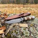 Scorpion Damascus hunting knife BMK-104 with stag antler handle and horn spacers with brown leather sheath